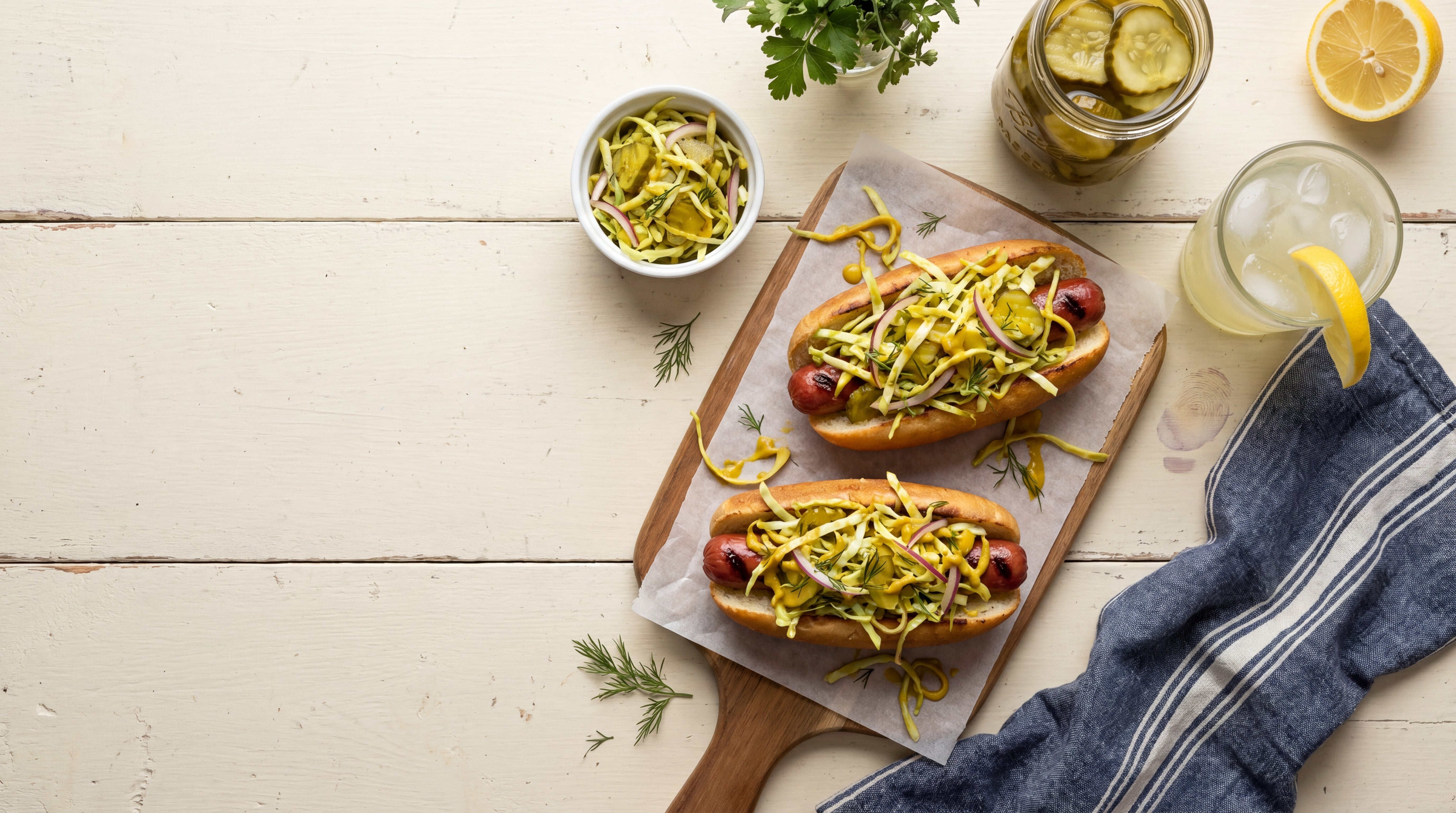 Hot Dogs with Mustard-Pickle Slaw